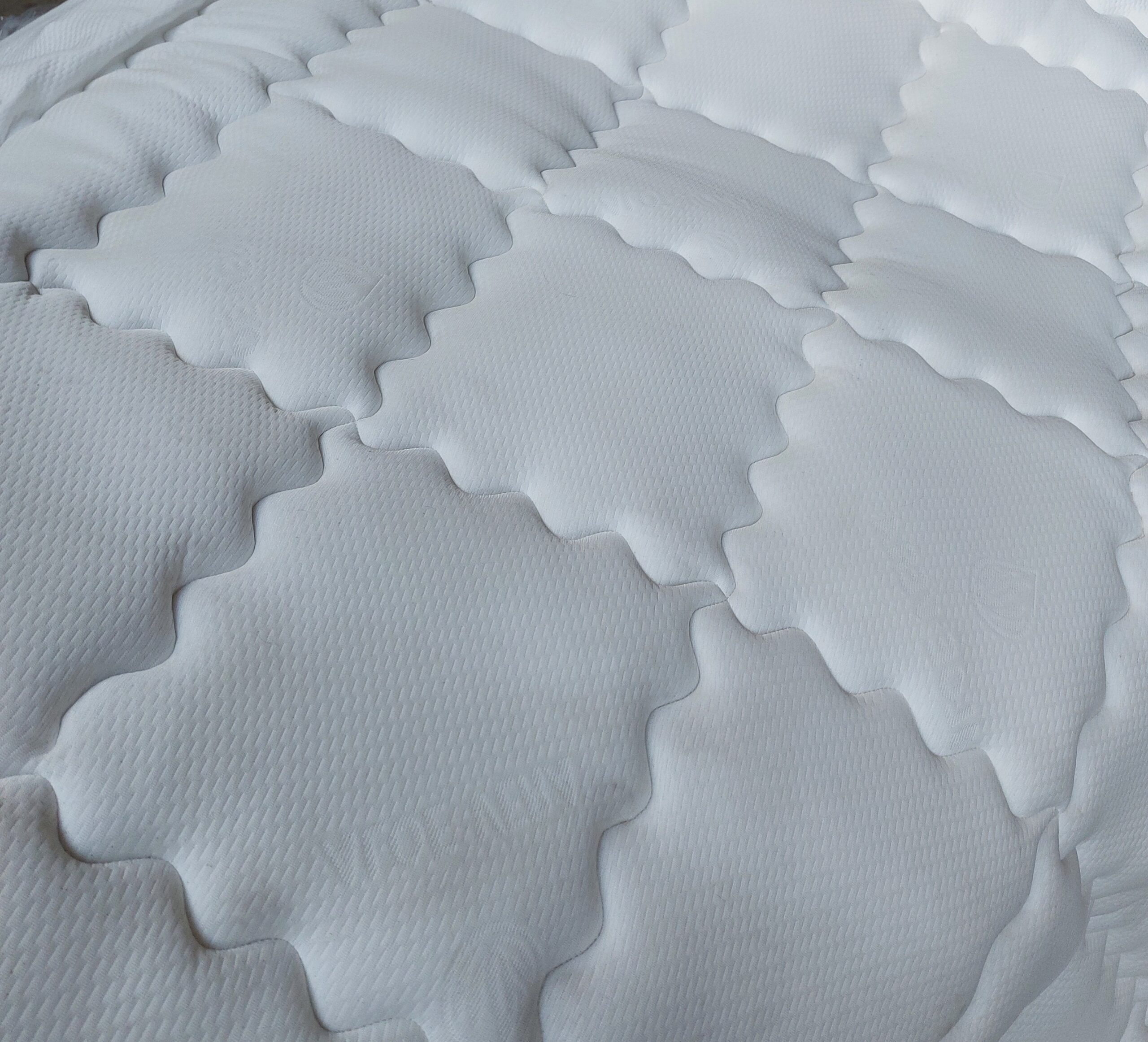 Καπιτονέ ραφή σε στρώμα